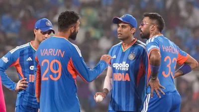 Cricket players discussing strategy on field.